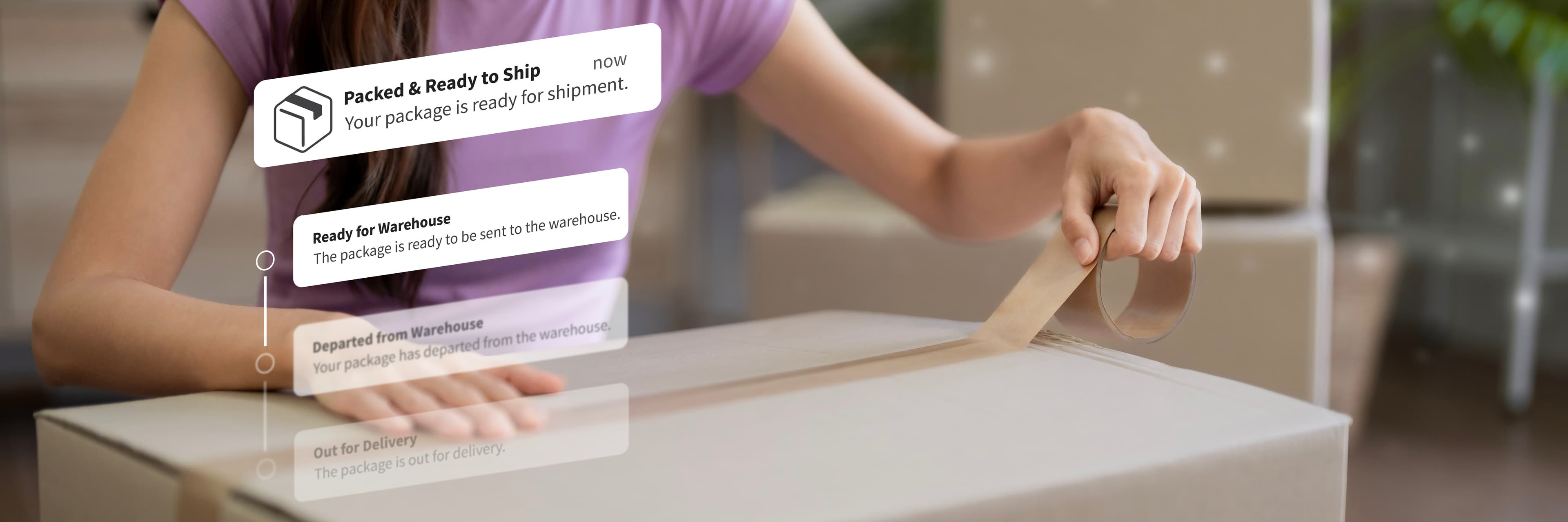 Warehouse worker reviewing automated shipping workflows on a tablet in a fulfillment center